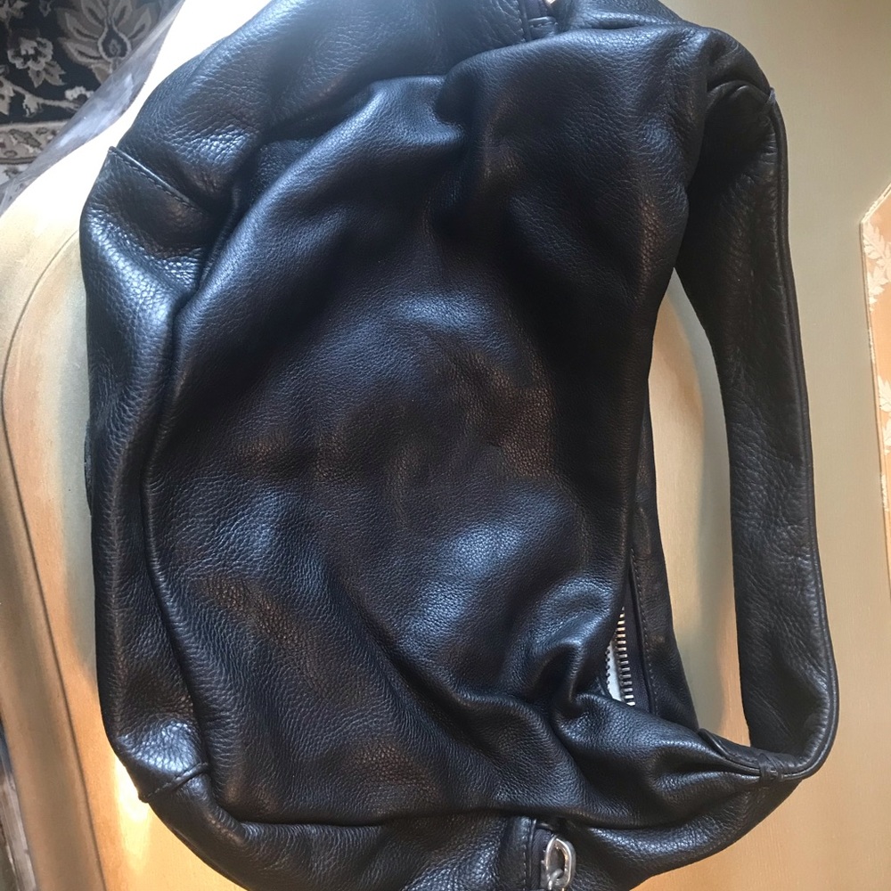 Roots leather purse